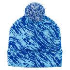 Blue patterned beanie with a pom-pom on a white background