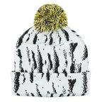White beanie with black pattern and yellow pom-pom on a white background